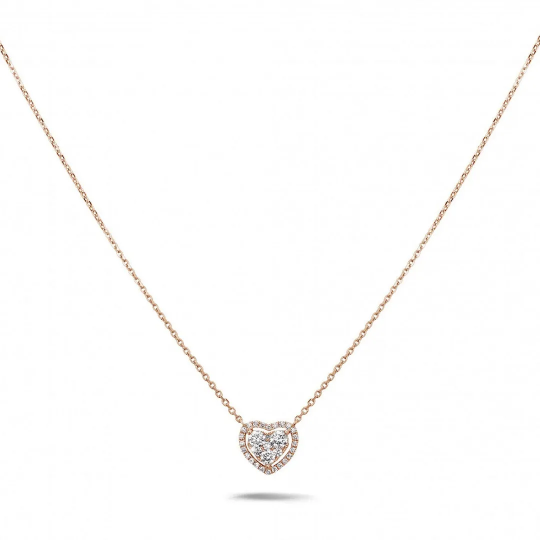 0.65 quilates colgante en forma de corazón con diamantes redondos en oro rojo 