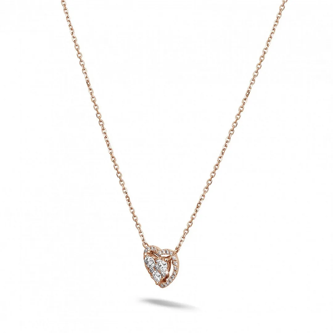 0.65 quilates colgante en forma de corazón con diamantes redondos en oro rojo 