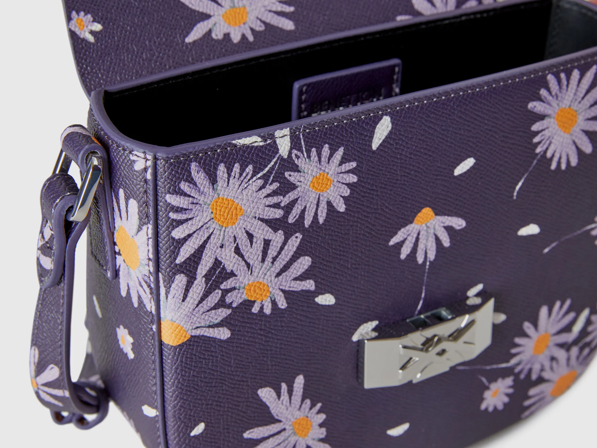 Bolso floral de tejido con efecto piel
