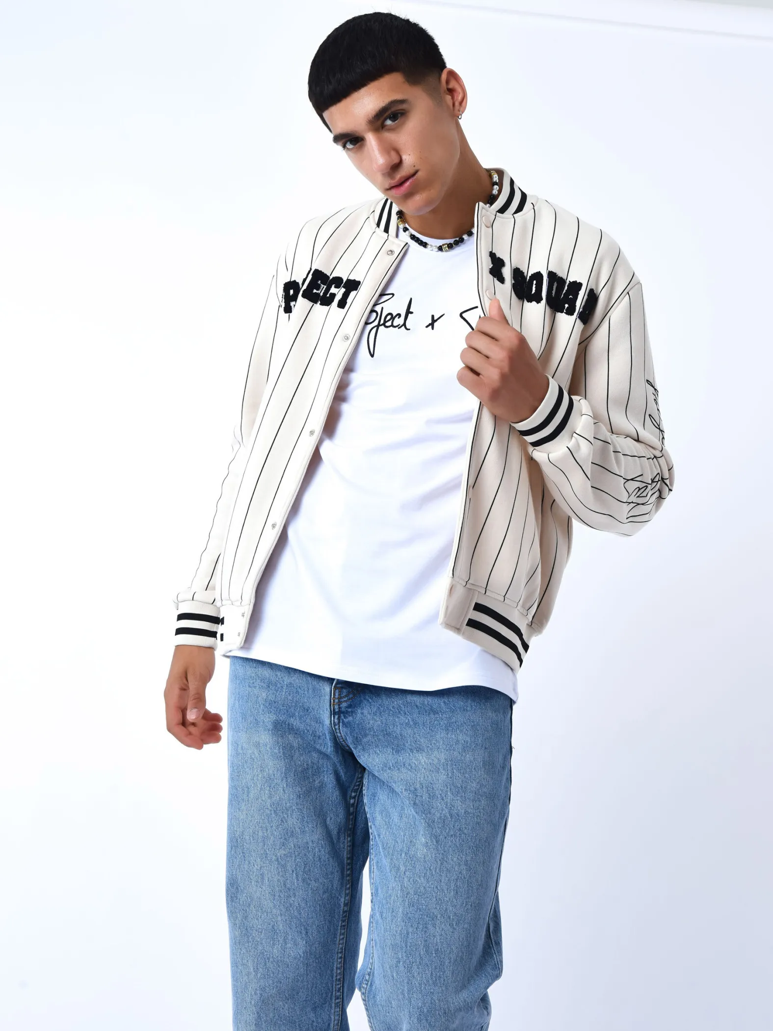 Chaqueta de estilo universitario con rayas