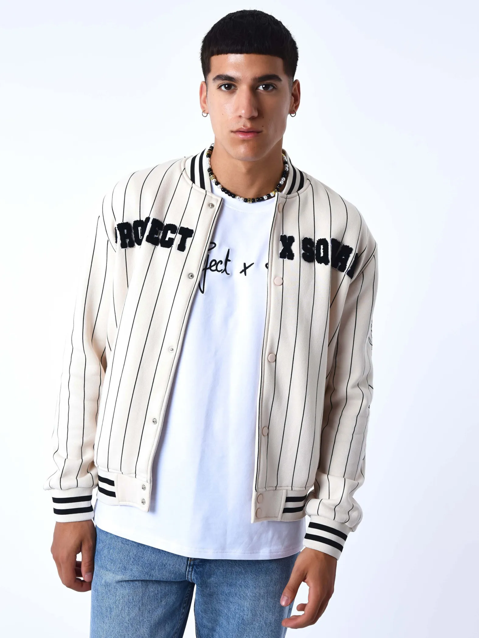 Chaqueta de estilo universitario con rayas
