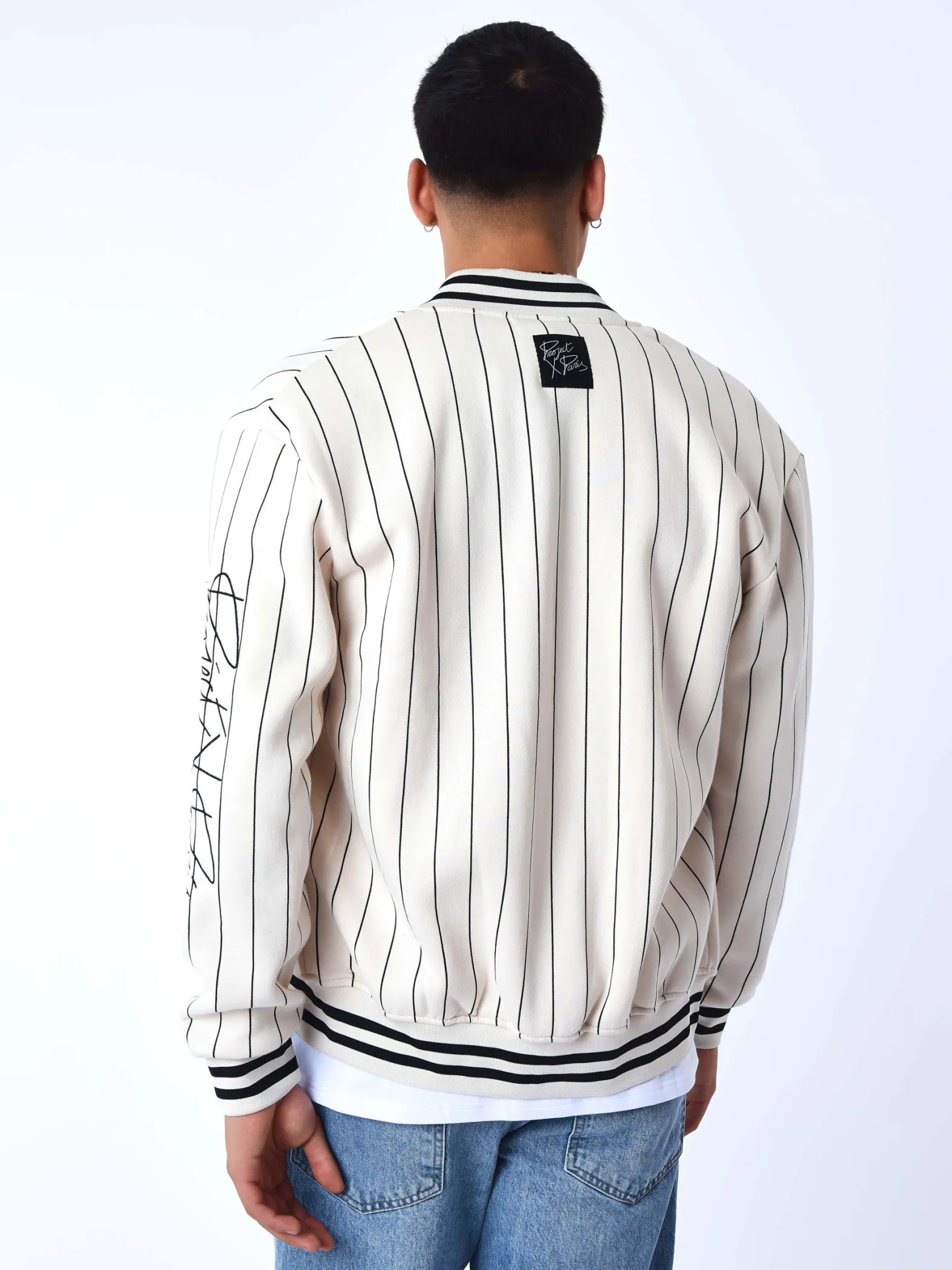 Chaqueta de estilo universitario con rayas