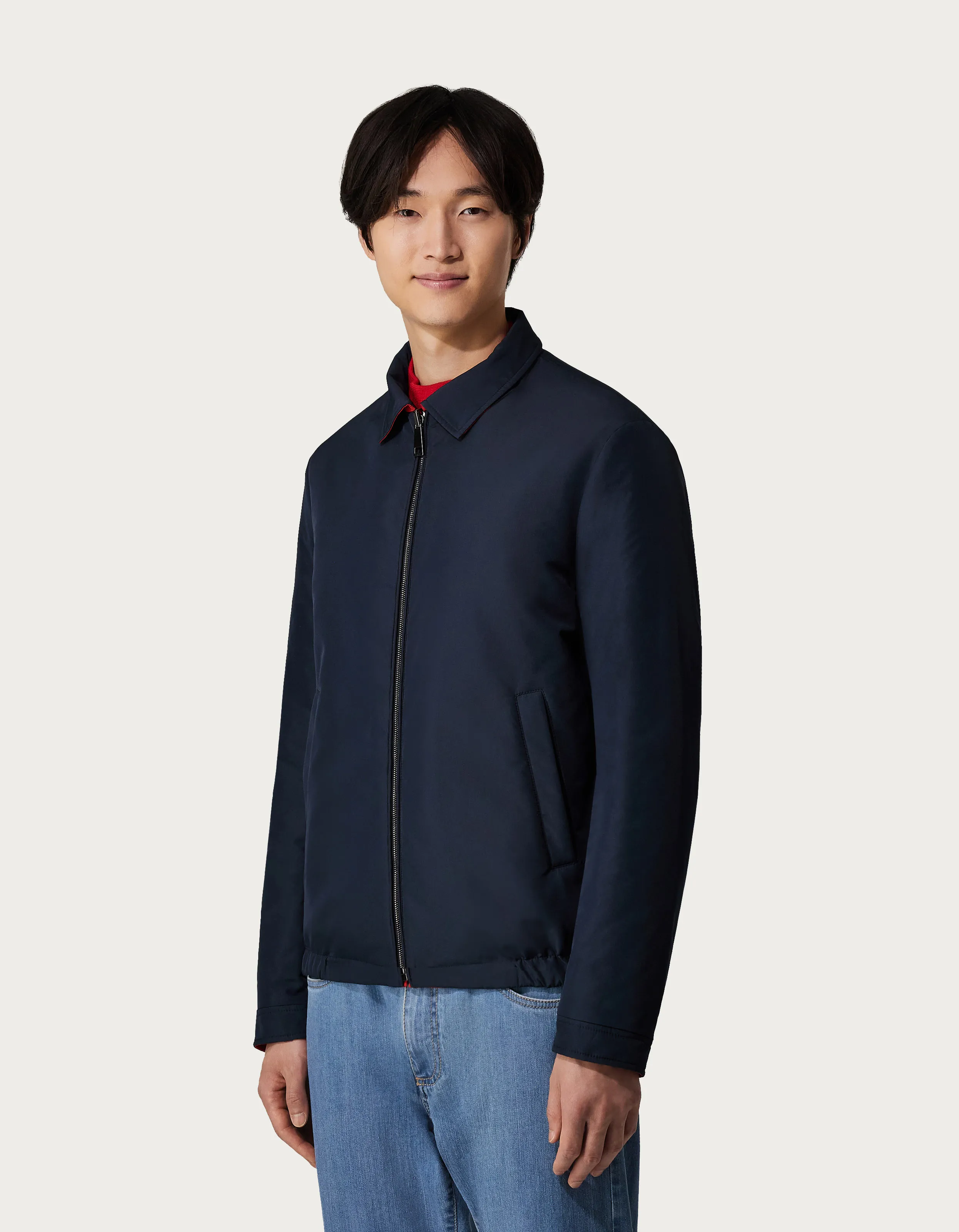 Chaqueta reversible en tejido técnico azul y rojo 