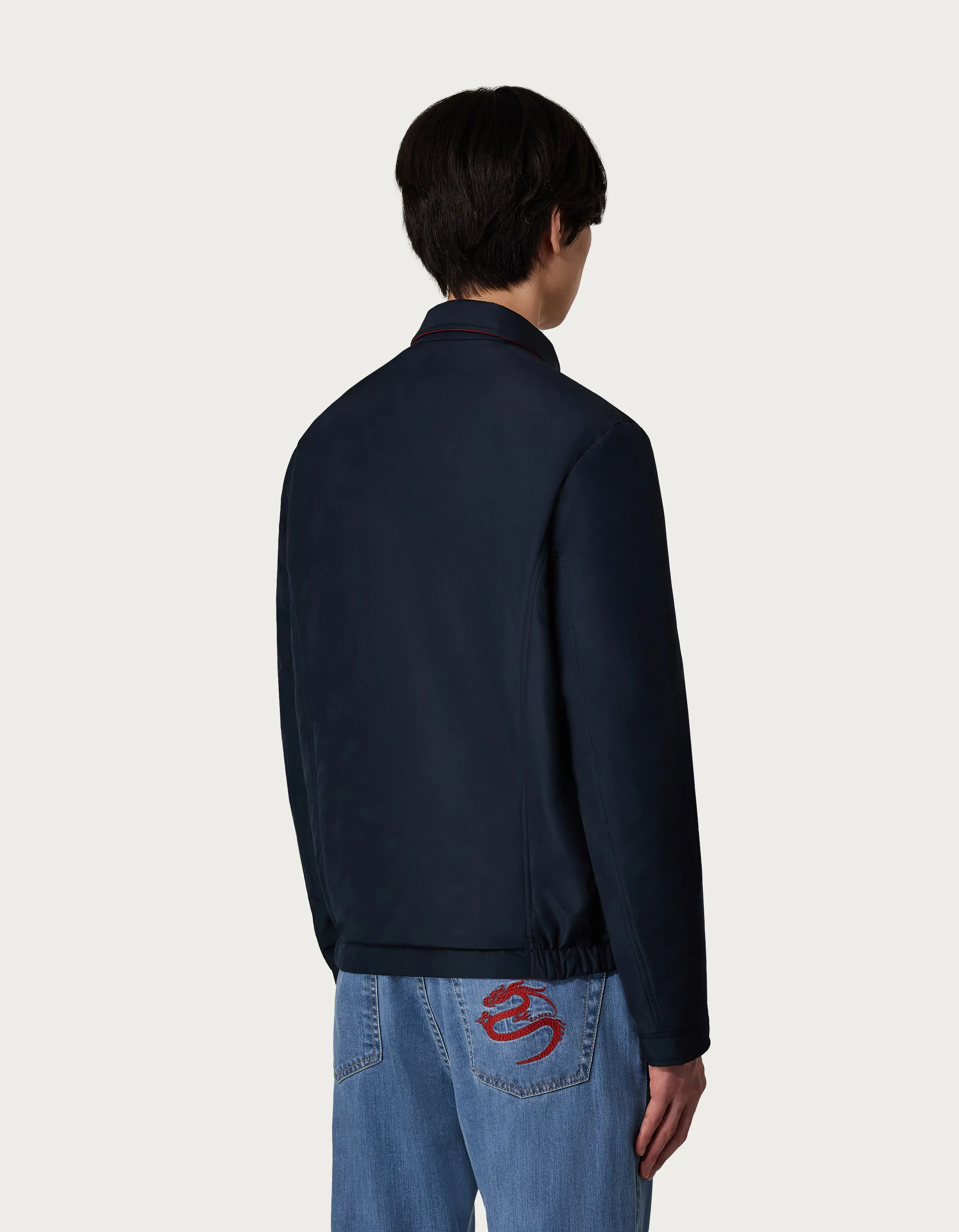 Chaqueta reversible en tejido técnico azul y rojo 
