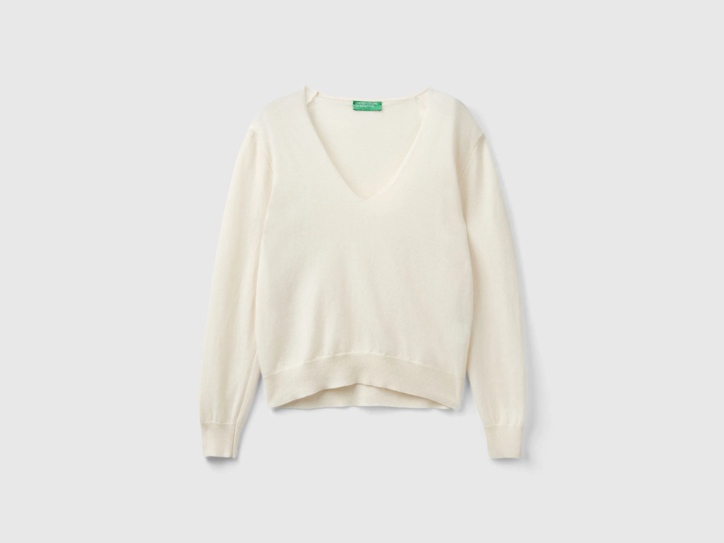 Jersey crema cuello en V en pura lana merina